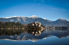 Beautiful Church of the Assumption reflecting in Lake Bled, Slovenia